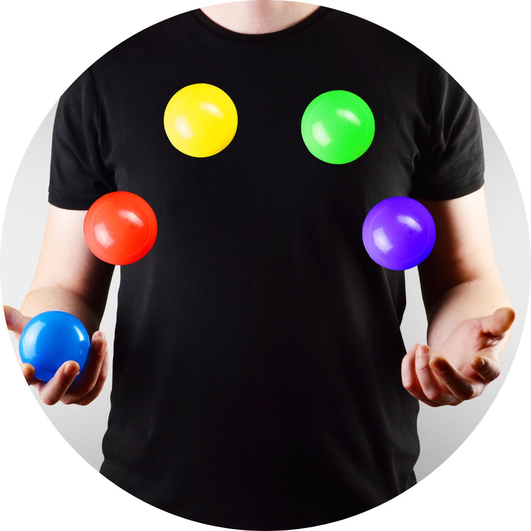 Someone juggling colorful balls.